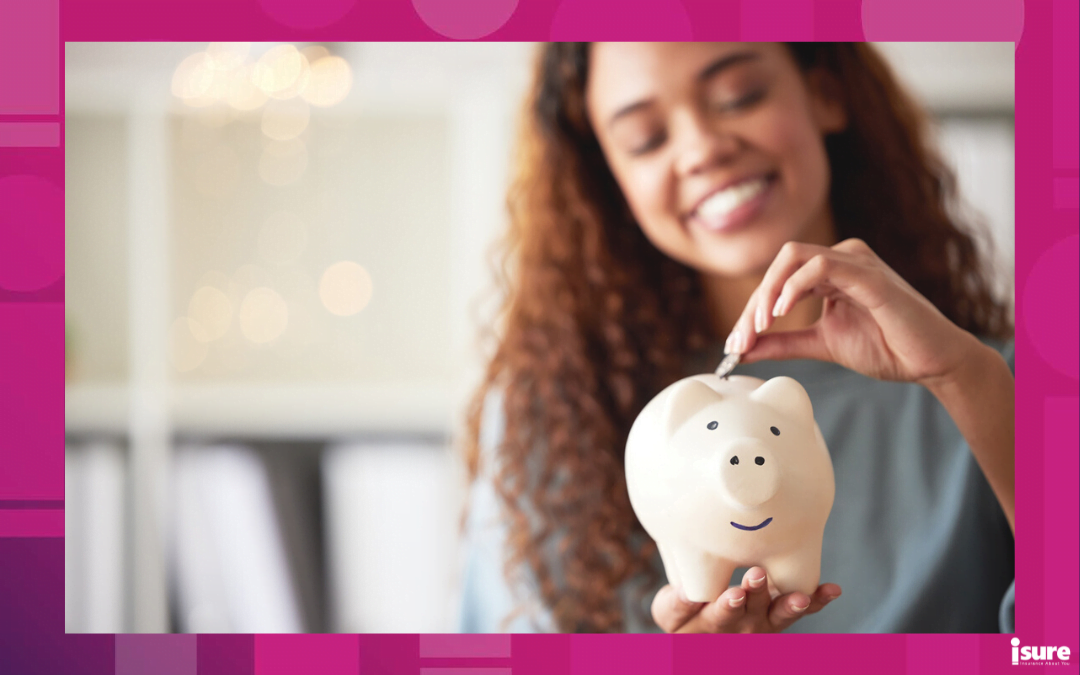 save on insurance - One happy young mixed race woman holding a piggybank and depositing a coin as savings. Hispanic woman budgeting her finances and investing money into her future. Saving funds for financial freedom