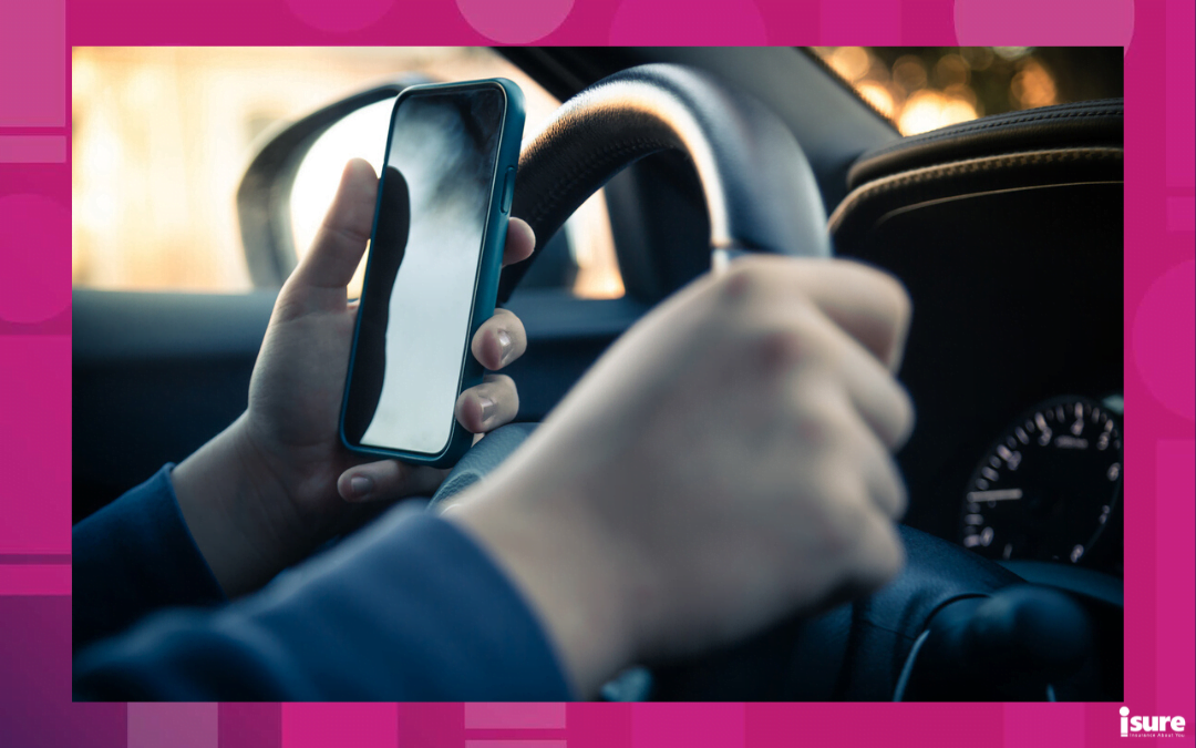 high risk car insurance - Teen drive a car and use smartphone. Young man reading messages holding a cell phone while driving. Dangerous behavior, accident risk. Danger, transgression, youth, distraction concept. Focus on hand.