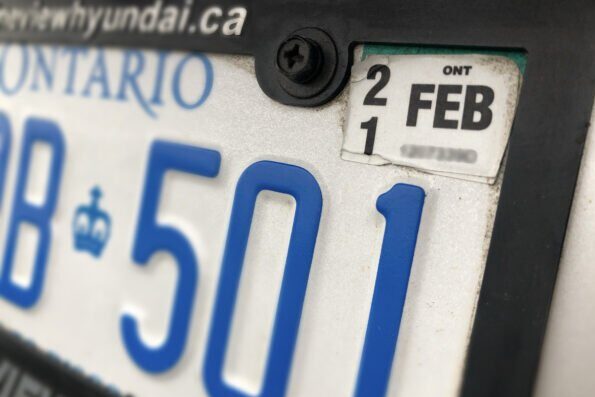 renew Ontario driver's licence - close up of Ontario license plate and sticker