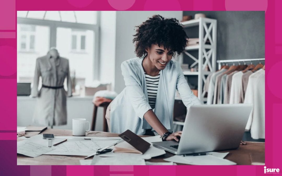 young business owner in her retail business on her laptop looking to celebrate Small Business Month