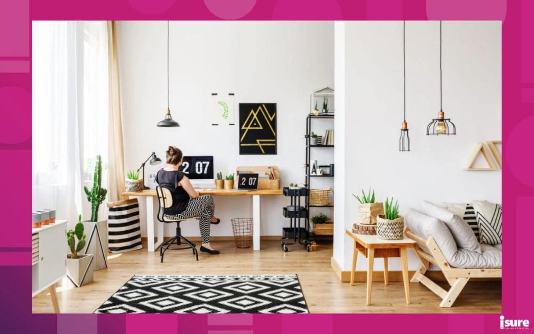 Young girl sitting at desk looking up information about her contents insurance policy in a bright, minimalist loft interior with simple white and wooden furniture, sofa, plants, basket, window, paper bag and industrial rack full of unique accessories
