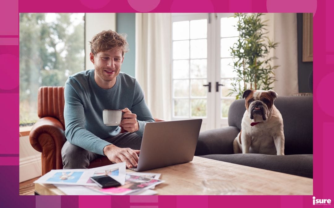 A man works in his living room remotely,