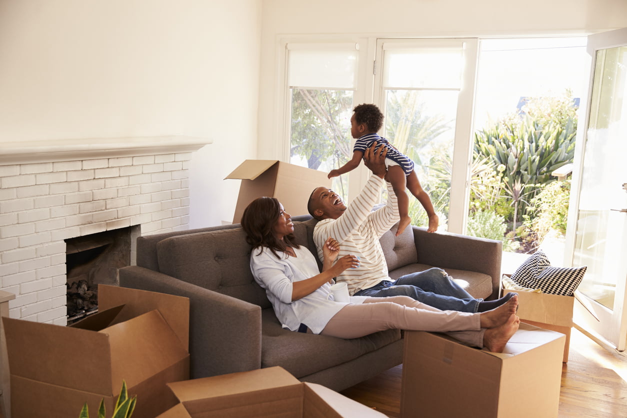 Parents Take A Break On Sofa With Son On Moving Day - Do I need title insurance?