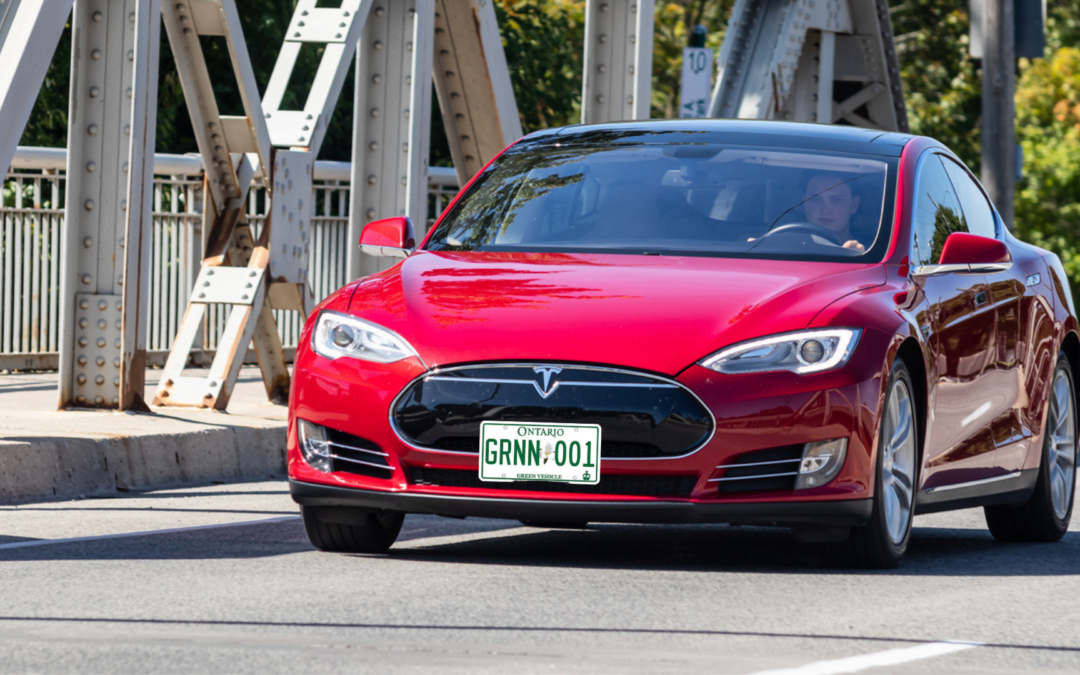 Green licence plate program - red tesla in Ontario