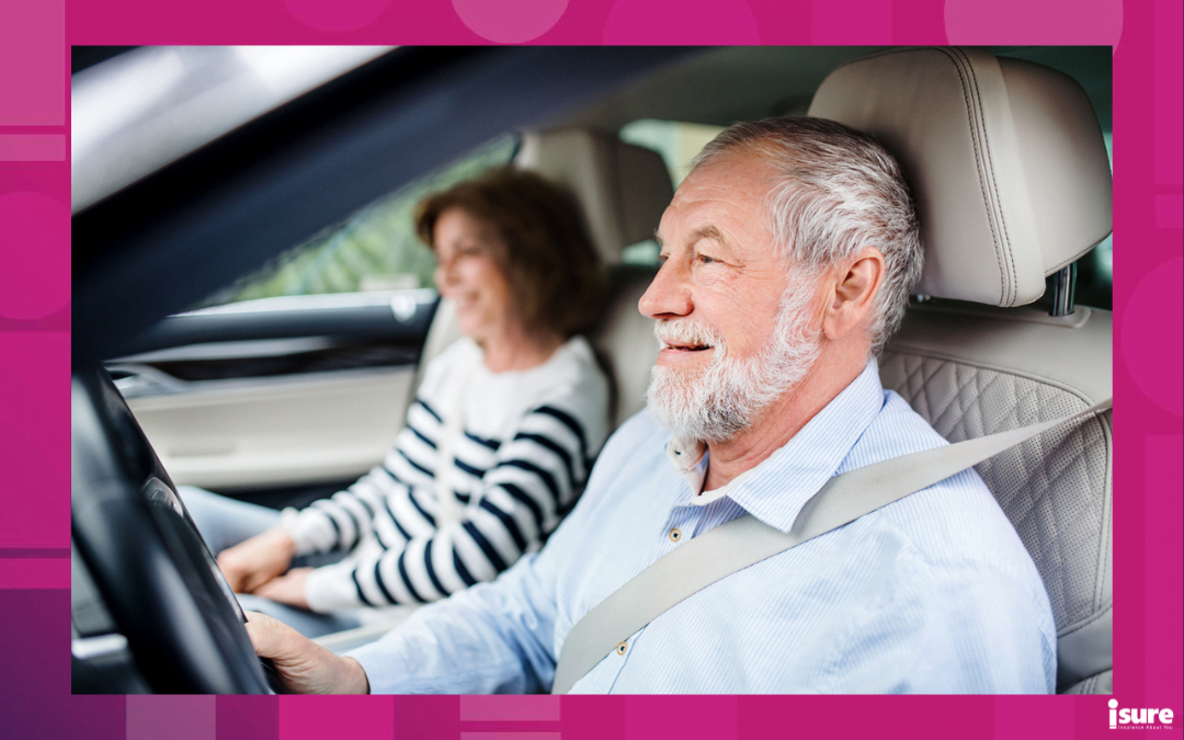 renew a senior driver's licence - A happy senior couple with smartphone sitting in car, driving.