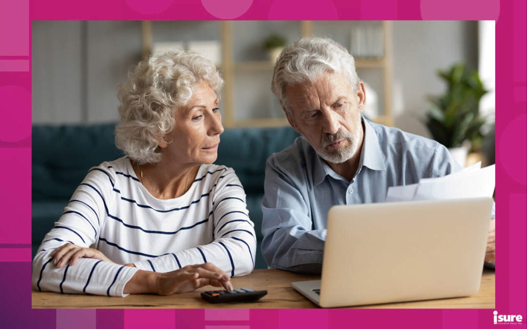 by-law insurance - Focused middle aged retired family couple managing monthly budget, involved in financial paperwork, paying taxes online using e-banking computer application or calculating expenses together at home.