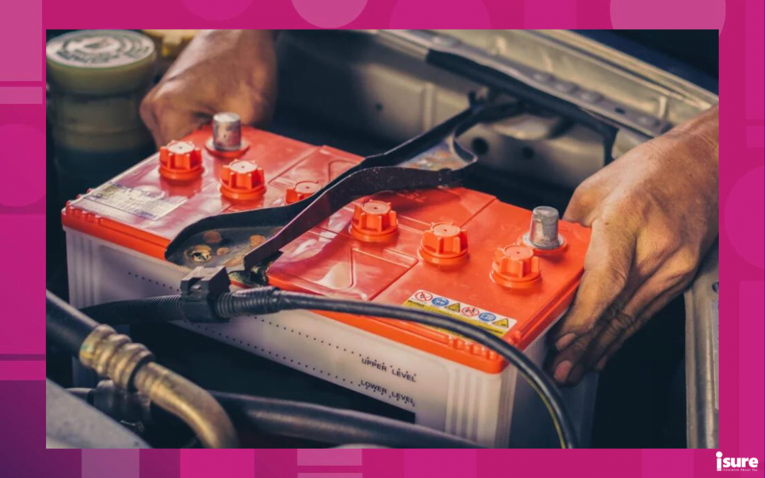car batteries - photo of a mechanic replacing a car battery