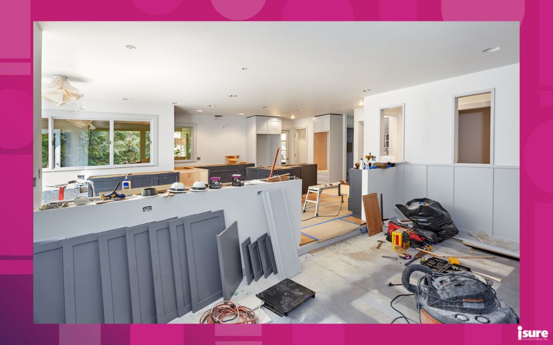 renovations affect insurance renewals - Painted cabinet doors, shelves, tools, lights, and trash bags decorate kitchen and family room during an extensive remodel