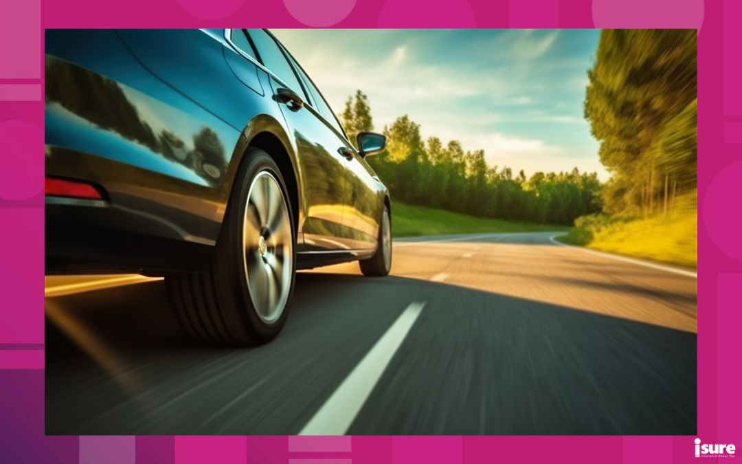 CLEAR - Low angle side view of car rushes along the highway at sunset