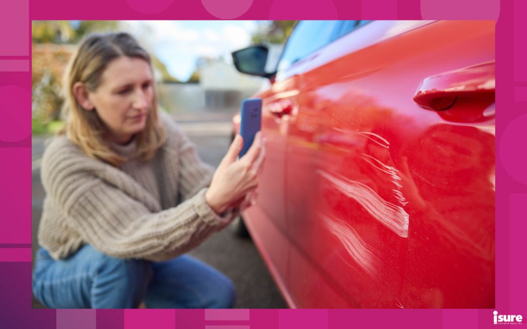 damages after filing a claim - Mature Female Driver Taking Photo Of Damage To Car After Accident On Mobile Phone