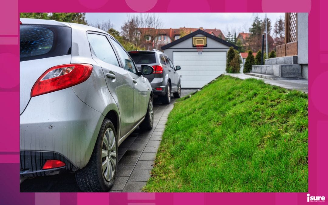Cars parked in driveway of Ontario home.