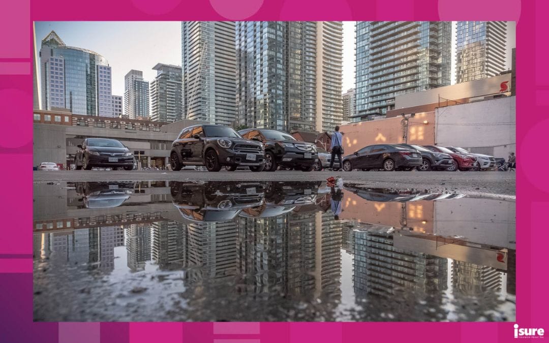 automotive application fraud - Cars parked in a parking lot in downtown Toronto.