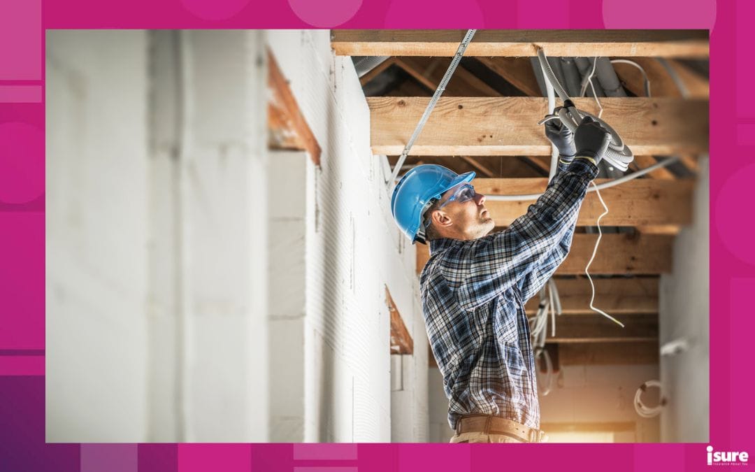 insurance coverage for electricians - Professional Caucasian Electrician Working on Electrical Wiring System Installation in New Residential House Ceiling.