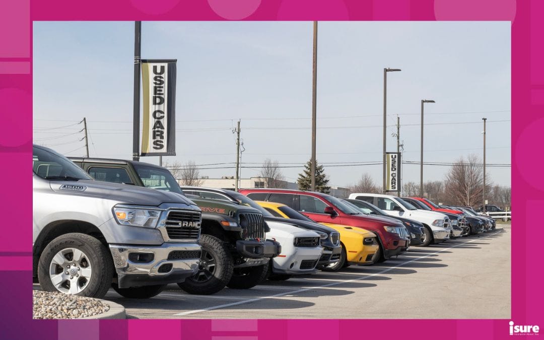 re-vinned vehicles - Used car display at a dealership. With supply issues, used and preowned cars are in high demand.