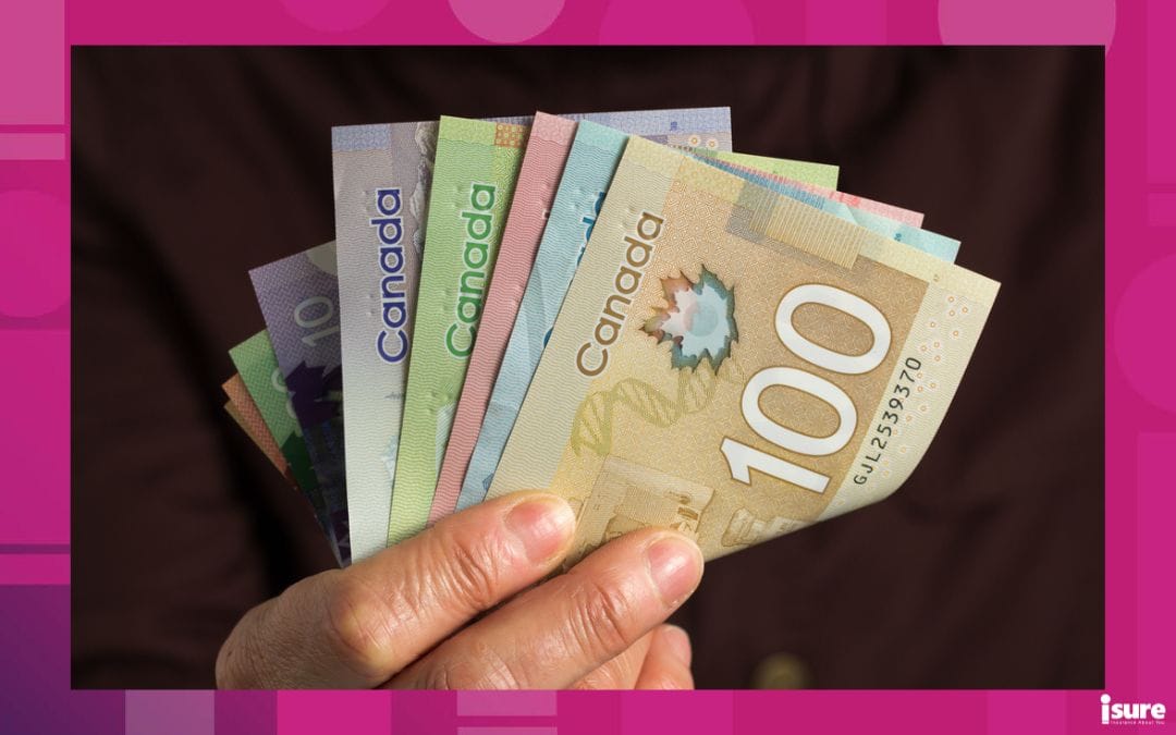 ontario premium insurance tax - Midsection Of Man Counting Money