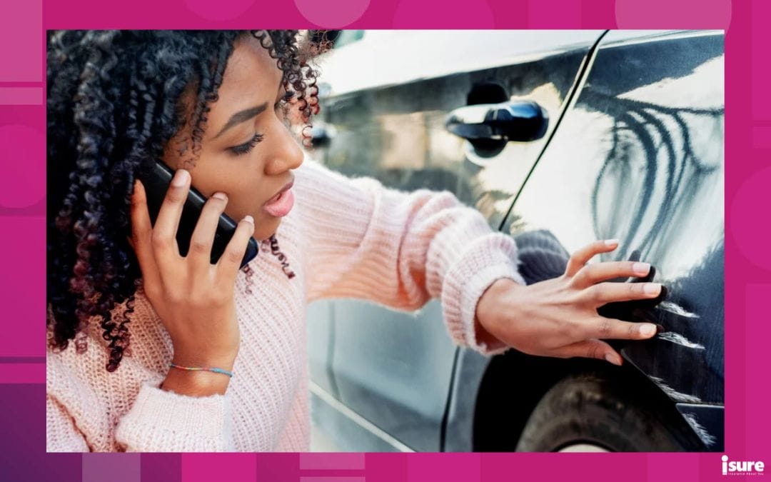 concerned woman looking closely at her damage vehicle after an accident - comprehensive auto insurance