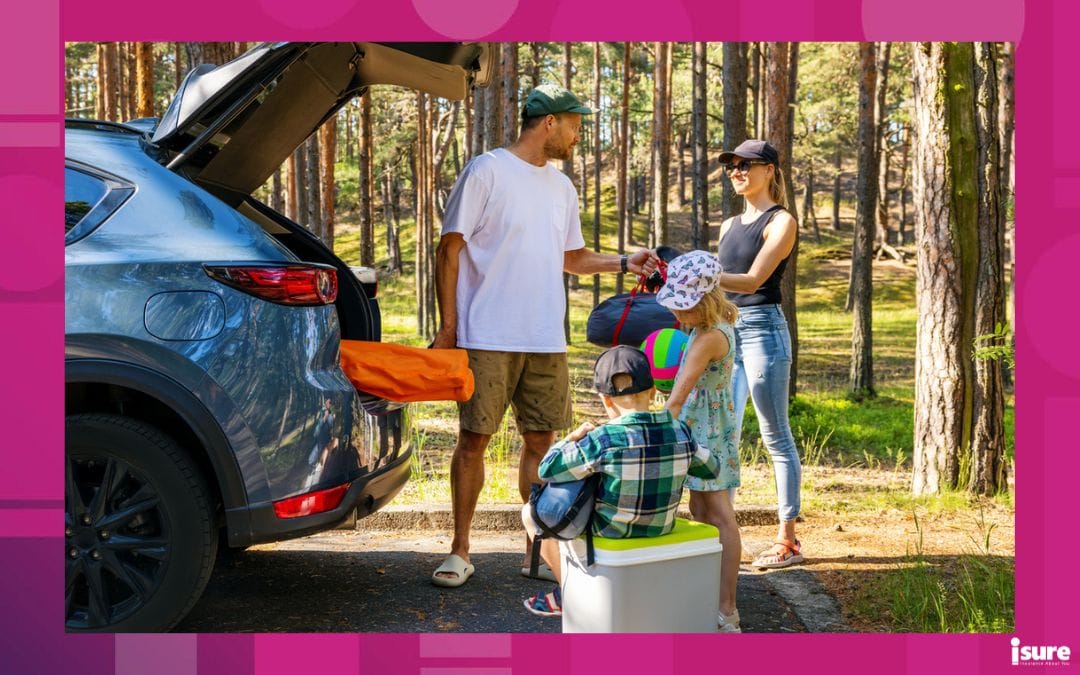 family road trip - family with kids remove the camping supplies from car trunk at forest. summer holidays, road trip