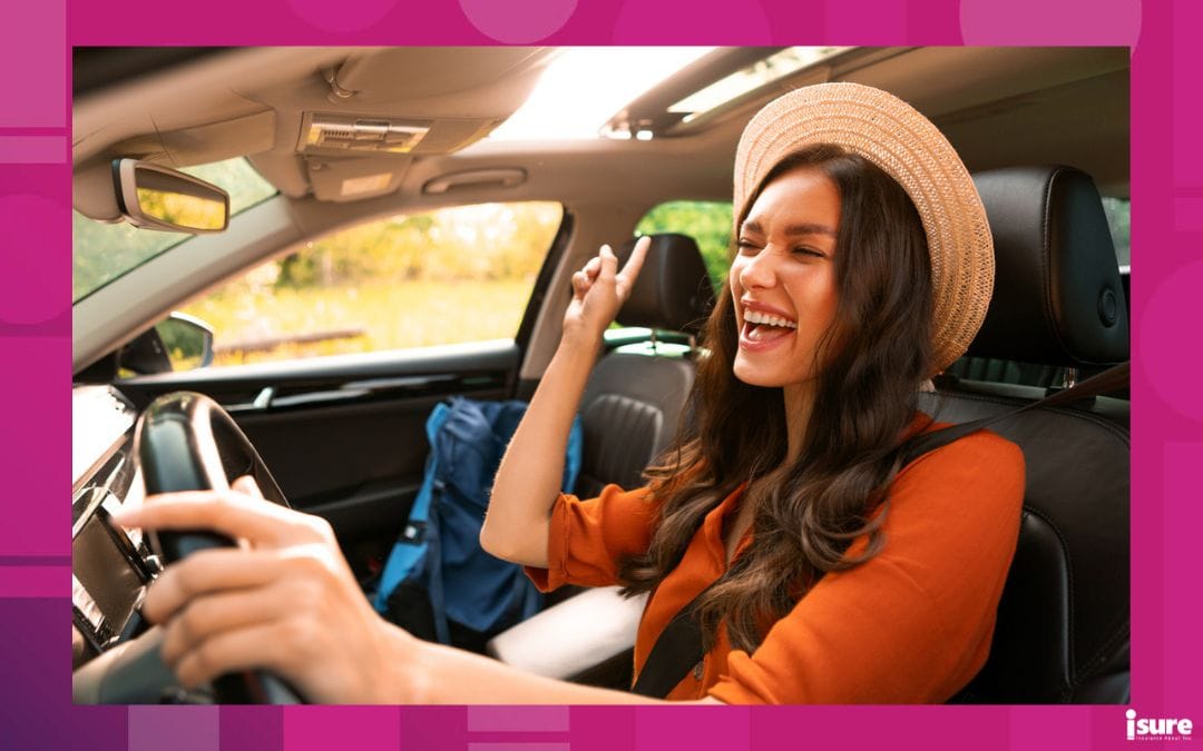 Overjoyed woman tourist enjoying car ride alone, listening to music, singing songs and dancing while driving auto with backpack nearby on passenger seat, covered by non-owner coverage