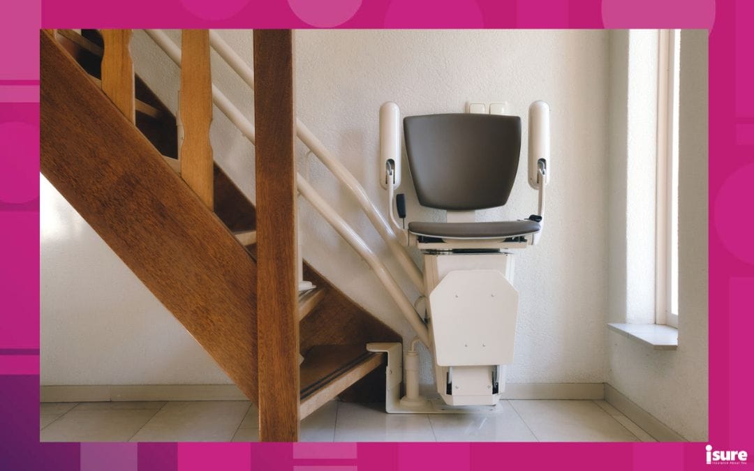 Automatic stairlift on staircase for elderly or disability in a house, taking people up and down, installed using the home accessibility tax credit