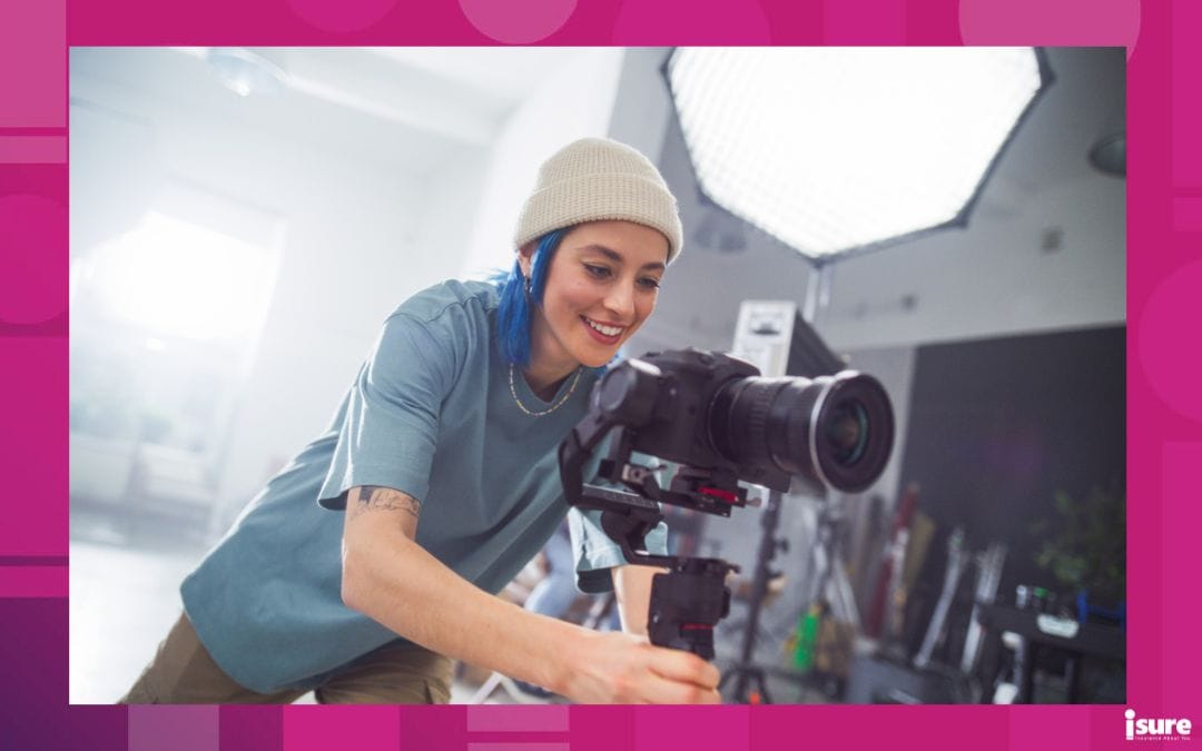 A photographer working in the studio, protected by freelance insurance
