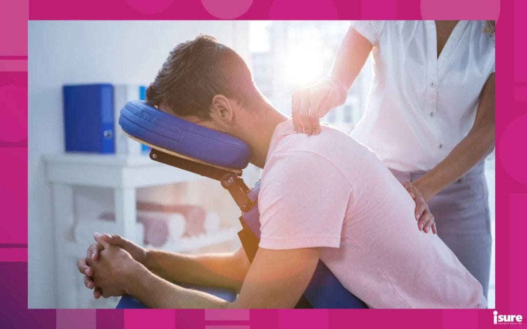 Physiotherapist giving back massage to a patient in clinic - Accident Benefits package