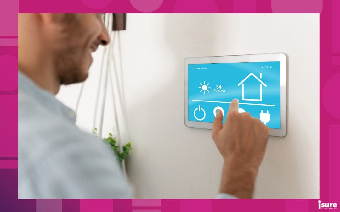 Closeup of a young man using a touch screen to control his smart home devices - keep your home cool