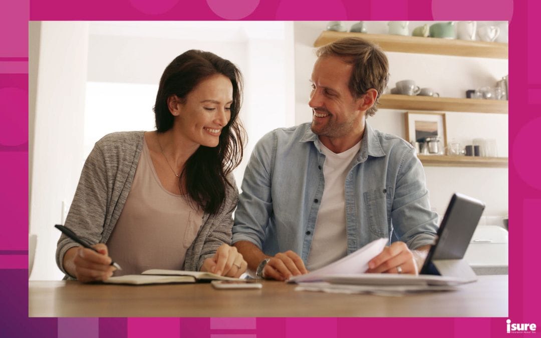Home, conversation and couple with smile, finance and payment for mortgage, rent and ecommerce Apartment, banking and man with woman in kitchen, investment and online shopping with savings or talking about bundling insurance as a married couple