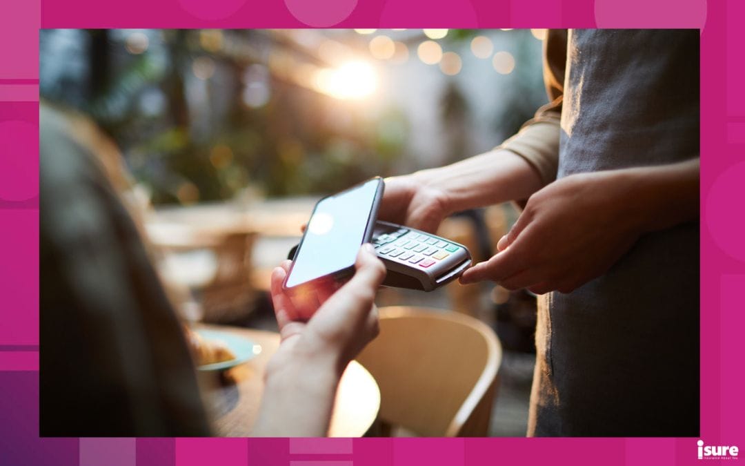 Close-up of unrecognizable woman using modern gadget while making online payment in cafe, nfc technology concept regarding POS security breaches