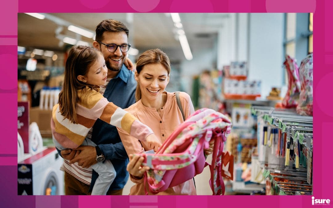 Little girl and her parents choosing backpack for school while shopping in the store together. Prepare your business for the BTS season with proper insurance coverage.