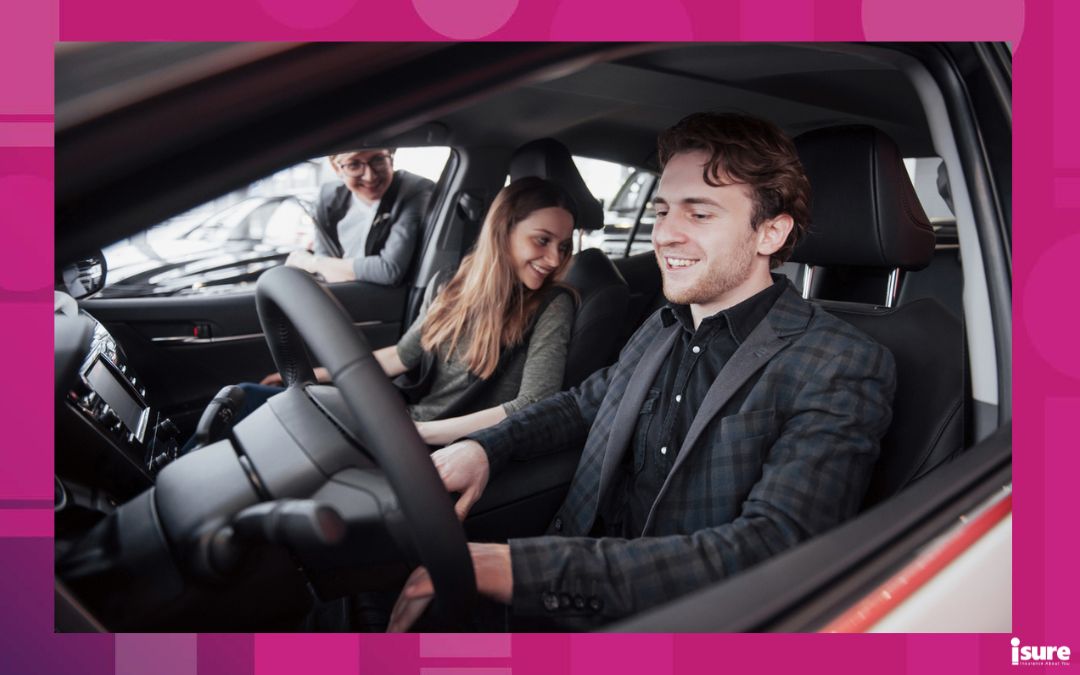 buying a used vehicle - Happy beautiful couple is choosing a new car at dealership.