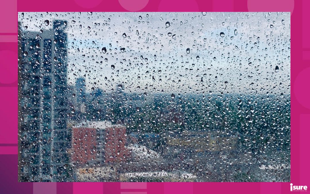 A rain covered window, rain and flooding is one of the most common reasons to file a home insurance claim.