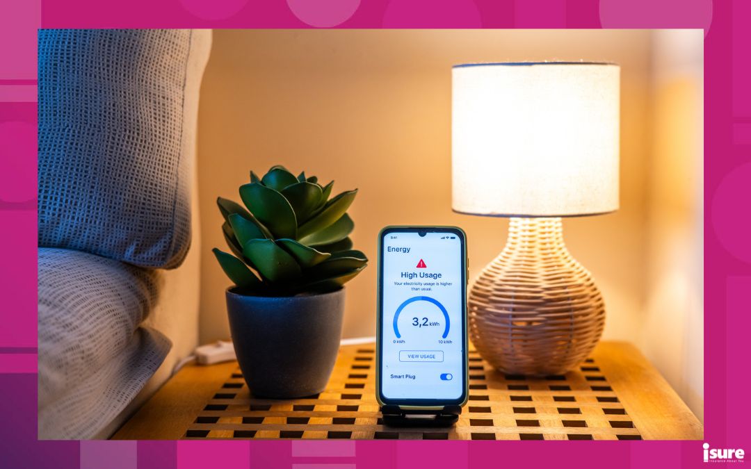 Smartphone is showing a high energy usage alert next to a lamp on a nightstand, suggesting an excessive electricity consumption in a bedroom, otherwise known as phantom power