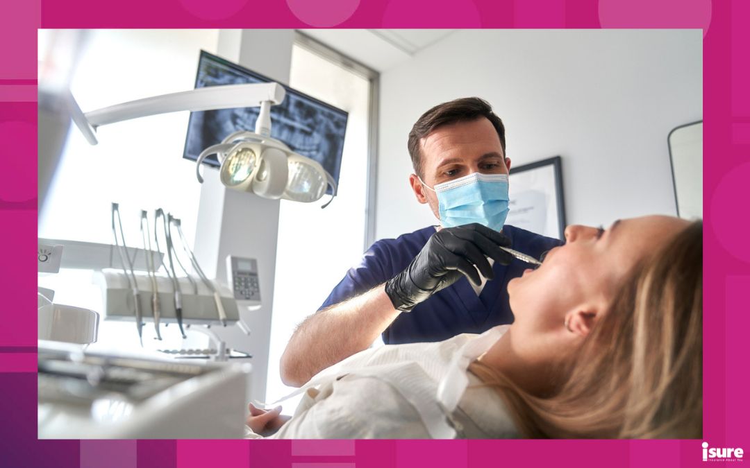 Woman having visit at dentist, one of many professions that evaluates their business insurance deductibles