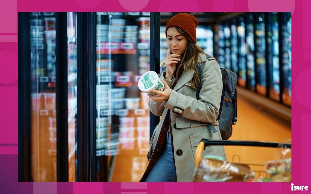 A woman shopping at the grocery store. Groceries are one of the many rising costs projected for Canadians in 2026.