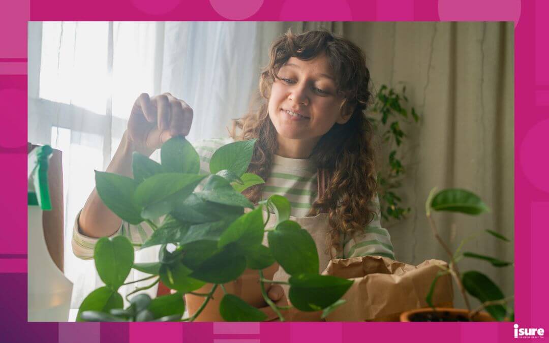 Young woman in an apron nurturing her houseplants at home, repotting them into terracotta pots. Gardening fills her days with joy and passion, surrounded by vibrant greenery