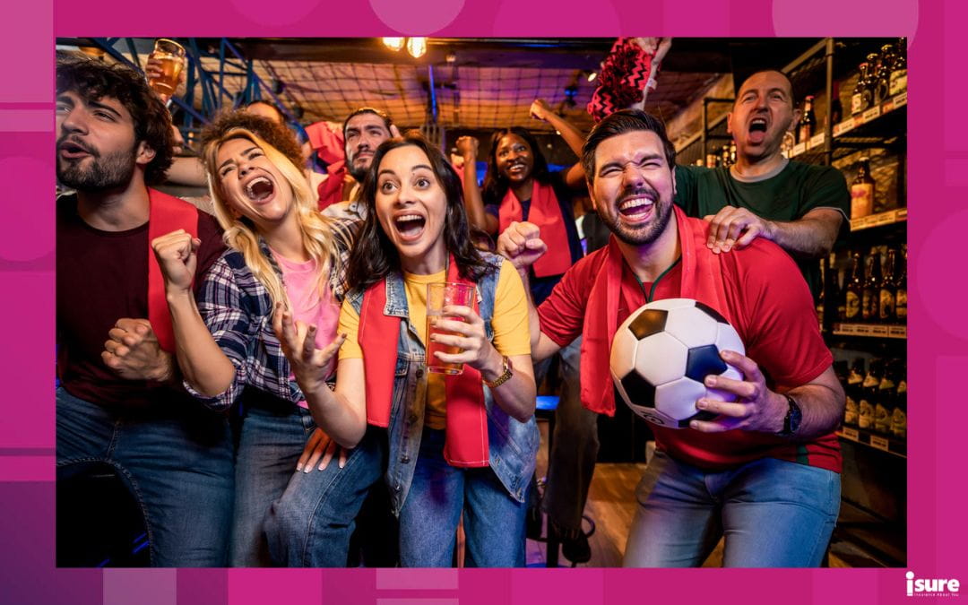 World Cup fans cheering for their team at a bar.