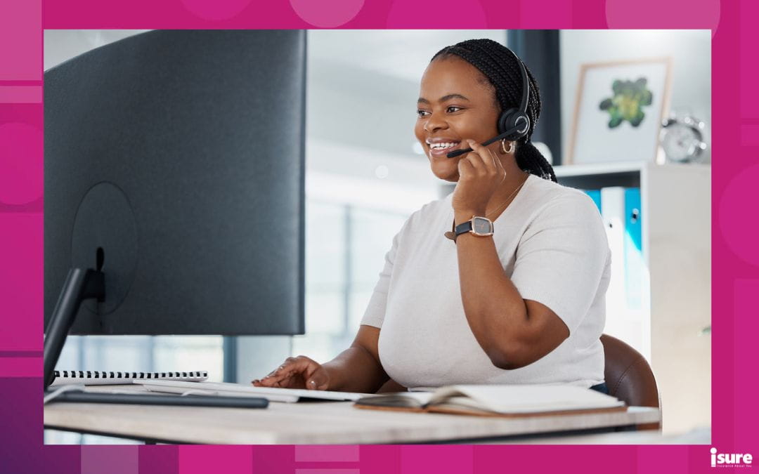 An insurance broker works with a client on the phone to figure out the best policy for them.