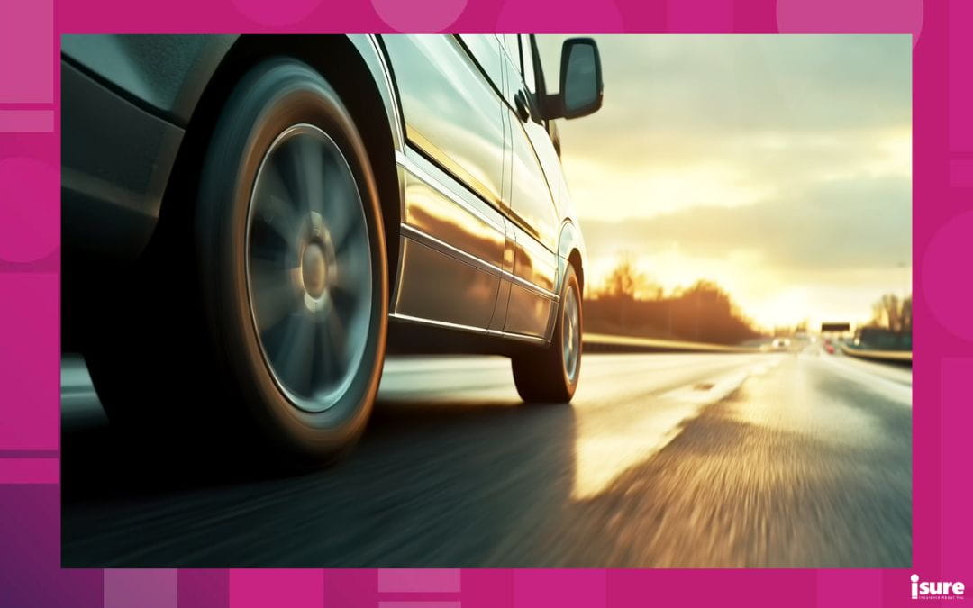 A brand new car on the road, covered with replacement car insurance.